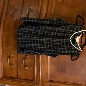 NWOT Loft sleeveless blouse. Button slit front with button.